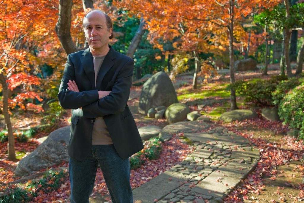 Tokyo author, Barry Lancet, is a thriller writer seen here in a Japanese garden, located in the Daikanyama district of Tokyo, Japan.